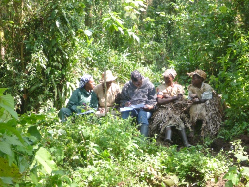 Uganda 19-019 Ann8.1- Batwa Cultural values assessment; ITFC staff and UOBDU site coordinator conducting research with Batwa in the forest